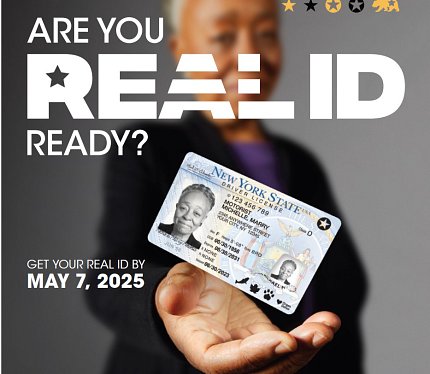 Poster that reads "Are you Real ID ready?" A blurry figure in the background holds a Real ID-compliant driver's license.