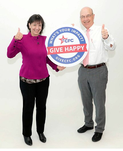 Bertagnolli, Gilman hold give happy cfc sign.