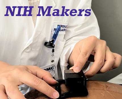 A person in a white coat positions a small black device on a pregnant person's abdomen. The words "NIH Makers" are written in blue font across the top of the image. 
