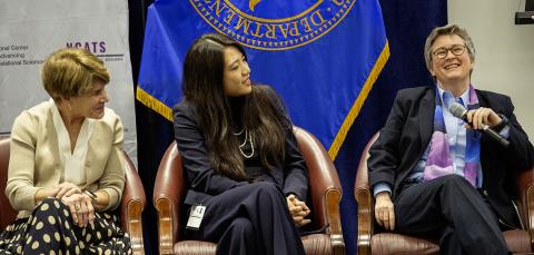 Rutter and two other panelists share a laugh.